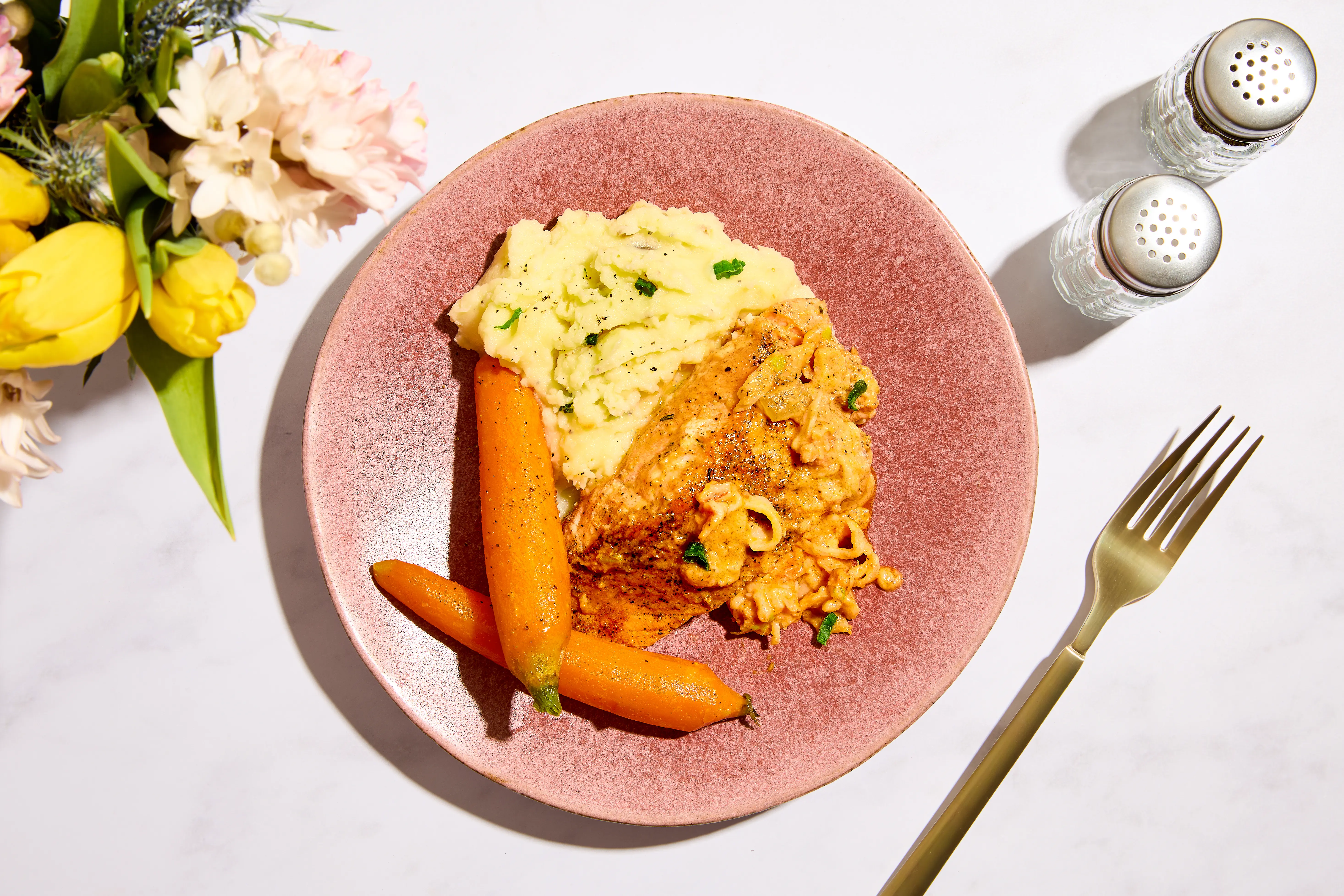 Brandy Lobster Sauce over Wild Caught Salmon with Truffle Mashed Potatoes, a Forkful-style prepared meal