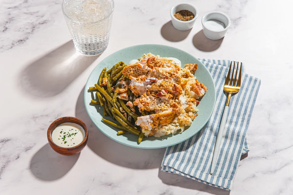 Bacon Ranch Chicken with Fontina Chive Cauliflower Mash, a Forkful-style prepared meal